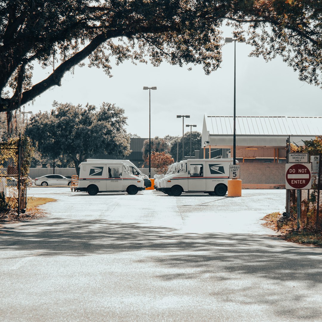 Post Office Parking Brandon Florida by Moving Checklist two vans are parked in a parking lot